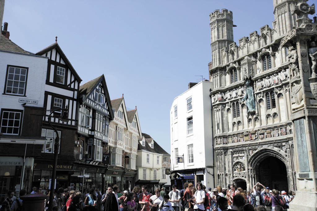 Street view looking up to Canterbury buildings along the street, filled with people