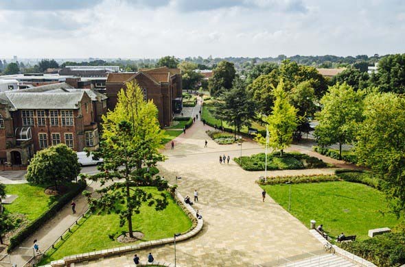 Aerial view of Southampton campus with green grass and trees amongst campus buildings