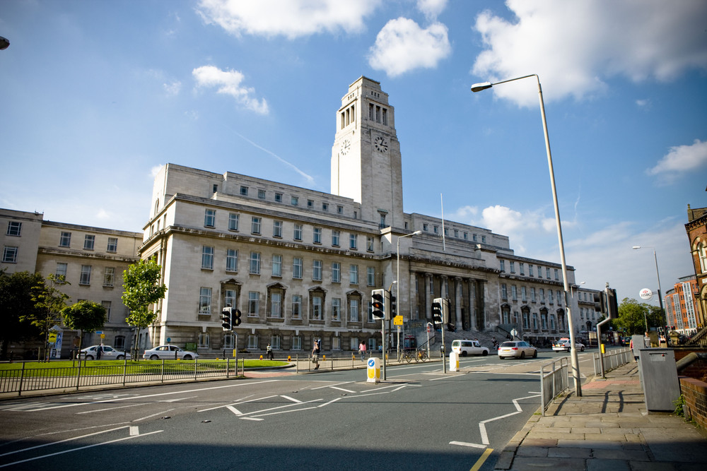 View of Leeds campus building with large clock tower