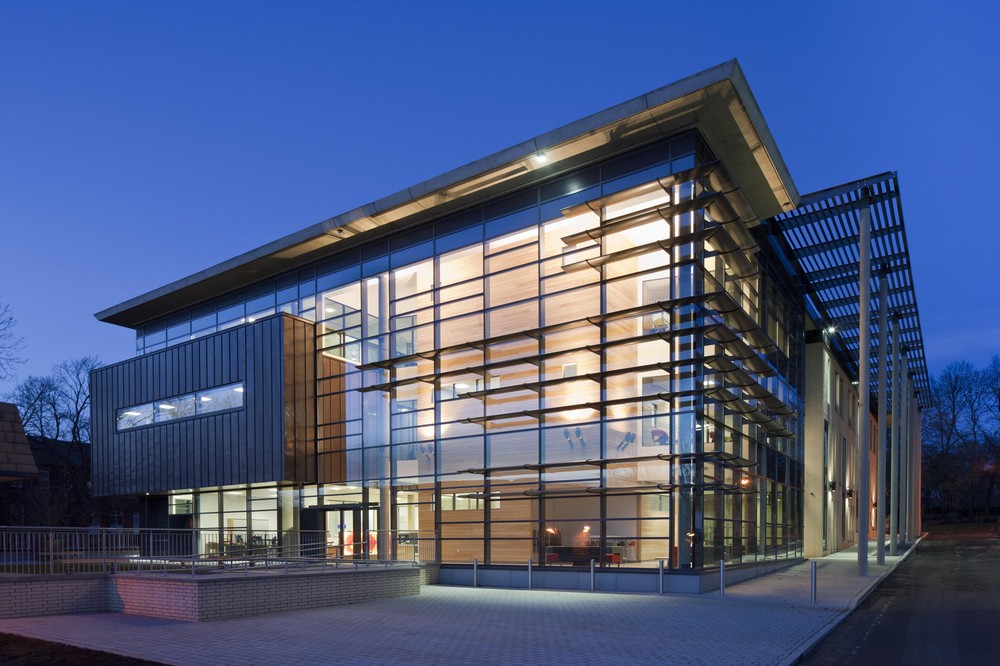 Evening view of lit up campus building