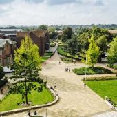 Aerial view of Southampton campus with green grass and trees amongst campus buildings