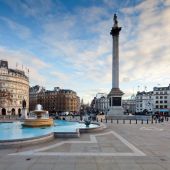 Sunny day overlooking Trafalgar Square fountains